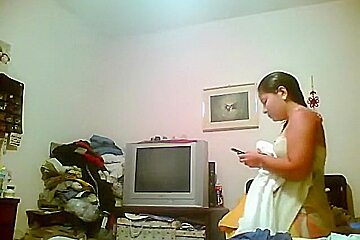Tapes A Chubby Brunette Girl With Tanlines Putting On Clothes In Her Bedroom