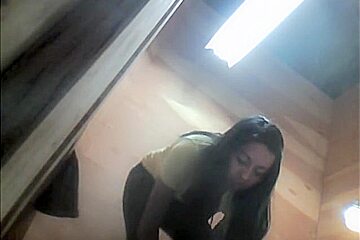 Changing Room Dark Haired Girl Is Taking Off Her Tight Pants