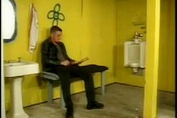 Two Leather Clad Guys Cruising In Toilets