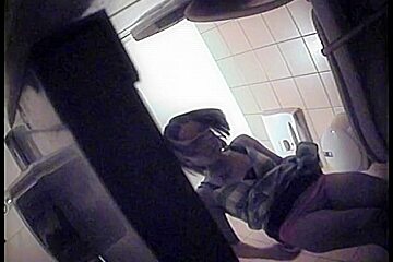 Sexy Wench In A Dress Exposing Her Ass On Toilet Camera