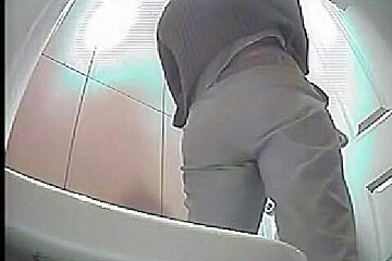 Great Footage With Peeing Woman In A Bathroom