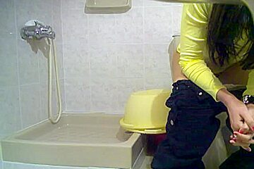 Dark Haired Cutie Spied While Sitting Her Butt On A Toilet