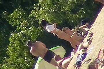 Beach Is Full Of Naked People That Are Relaxing