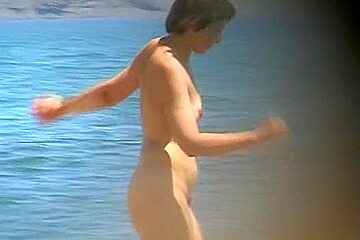 Nude Mature Takes A Nice Swim