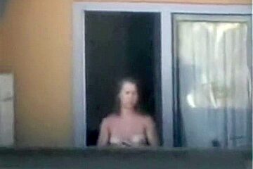 Sexy Neighbor Showing Off Her White Tits In The Window