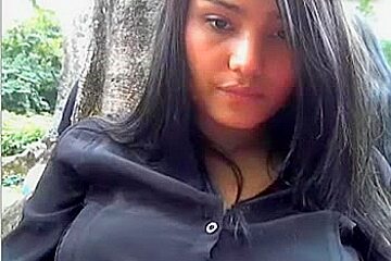 Colombian Girl In Public Park